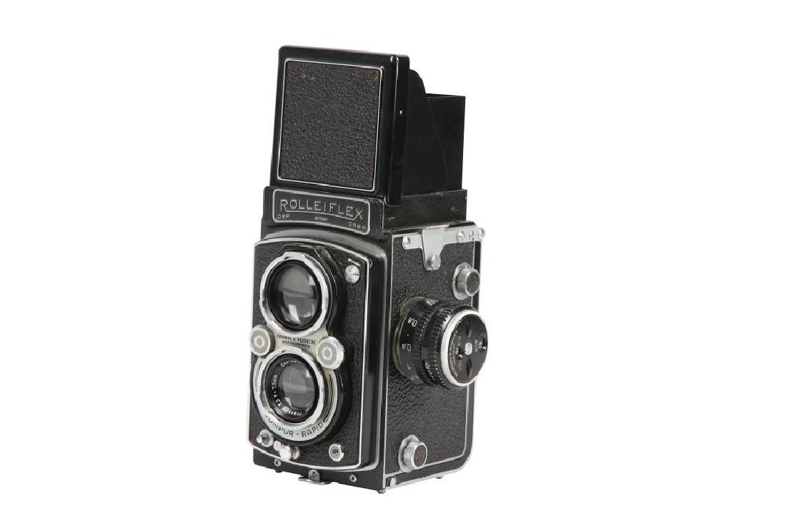 A Rolleiflex Automat TLR Camera: A Rolleiflex Automat TLR Camera Serial No: 927930 Date: 1939-1945 Body: G Shutter: working Viewing Lens: Heidoscop Anastigmat 75mm f/2.8 Taking Lens: Carl Zeiss Jena 7.5cm f/3.5 Tessar no.2498676 Opti