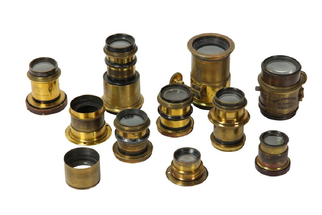 A Selection of Brass Camera Lenses: A Selection of Brass Camera Lenses a wide range including an early Ross (A. Rofs London 3856) landscape lens, a E & J Underwood half plate rapid rectilinear, a Horne & Thornwhaite rack and pinion focu