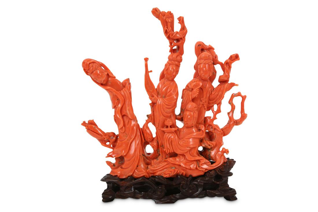 A LARGE CHINESE CORAL 'IMMORTAL MAIDENS' CARVING.: A LARGE CHINESE CORAL 'IMMORTAL MAIDENS' CARVING. Early 20th Century. Carved as a group of four graceful Immortal maidens draped in flowing robes, one holding a peach, the second a lute, the third a r
