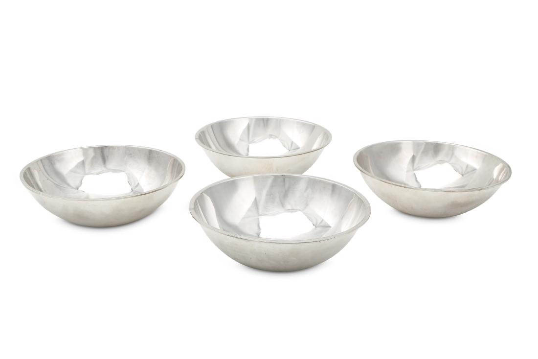 A set of four George III sterling silver sauce tureen: A set of four George III sterling silver sauce tureen liners, two London 1812 by Benjamin Smith II & James Smith III (reg. 23rd Feb 1809), the other two London 1812 by Benjamin Smith II (reg. 14th Oct