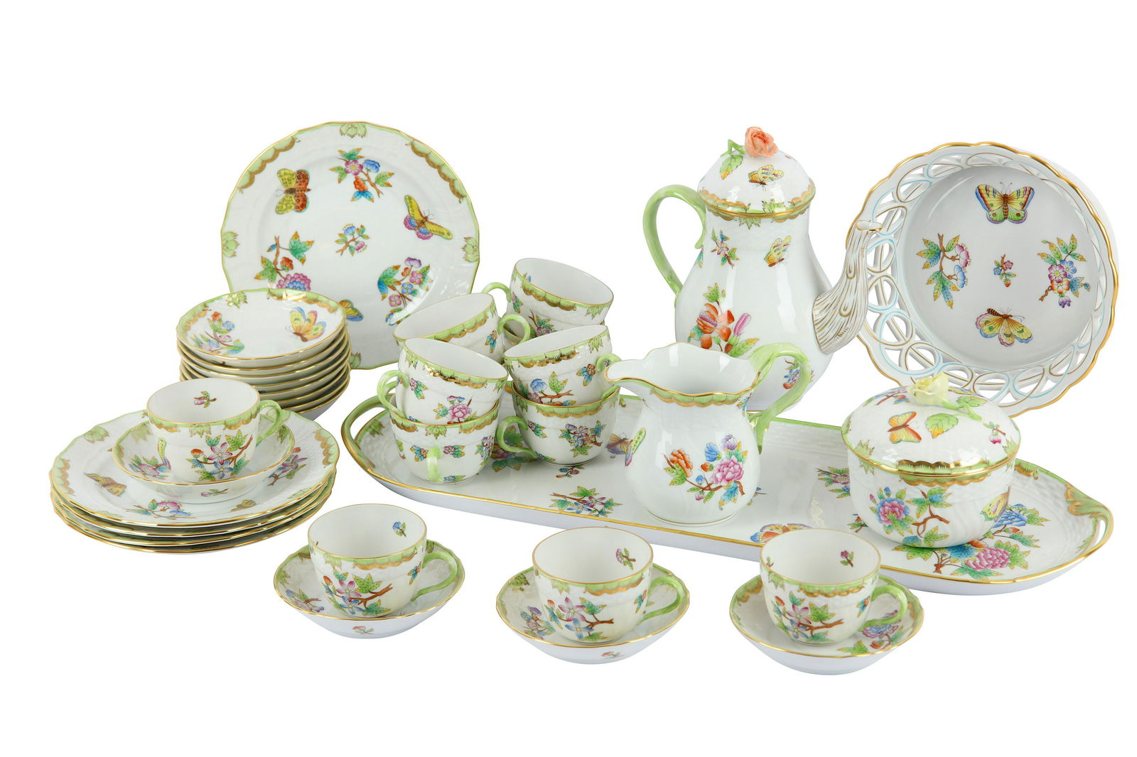 A Hungarian Herand porcelain coffee set in the Queen: A Hungarian Herand porcelain coffee set in the Queen Victoria pattern, number 1612, circa 1940s, decorated with flowers, floral sprigs and butterflies comprising of coffee pot, coffee cups and saucers