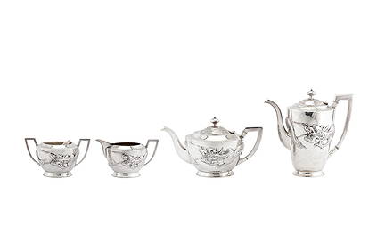 A mid-20th century Chinese export silver four-piece tea (1 of 2)