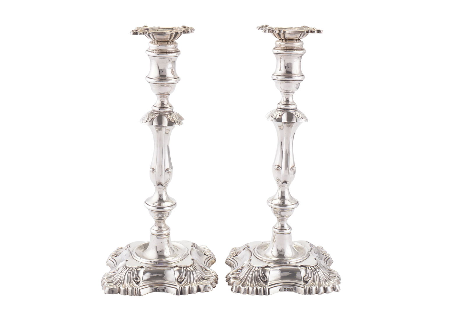 A pair of George V sterling silver candlesticks, (1 of 3)