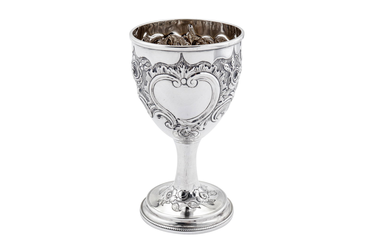 A George III sterling silver goblet, London 1788 by: A George III sterling silver goblet, London 1788 by Charles Hougham the rounded base upon a pedestal circular foot with cavetto edge and beaded rims. The body with later embossed decoration of flower
