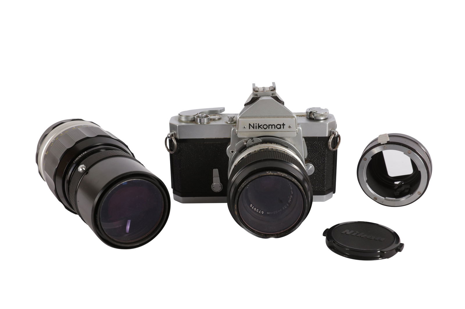 A NIkon Nikomat FTN SLR Camera Outfit: A NIkon Nikomat FTN SLR Camera Outfit Serial No: 4325181 Body: F, some small dings to top plate and prism Shutter: working Lenses: a Nikon 55mm f/3.5 Nikkor-P Ai lens / A Vivitar Series 1 70-210mm f/3