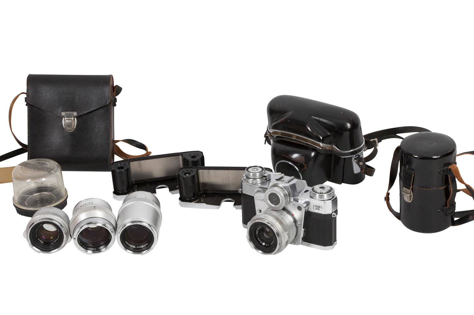 A Zeiss Ikon Contarex SLR Camera Outfit: A Zeiss Ikon Contarex SLR Camera Outfit Serial No: T91651 Body: G Shutter: working Lenses: Carl Zeiss 35mm f/4 Distagon (3702804) 50mm f/2 Planar (2377440) 85mm f/2 Sonnar (2624542) 135mm f/4 Sonnar (