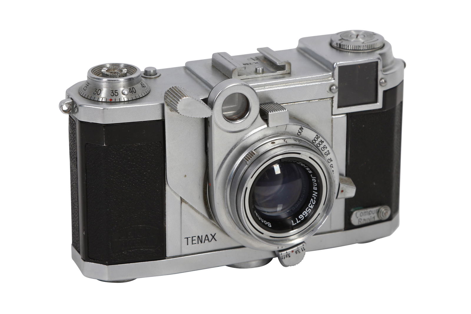 A Zeiss Ikon Tenax II Rangefinder Camera: A Zeiss Ikon Tenax II Rangefinder Camera Serial No: H.75956 Body: G/VG Shutter: working Lens: Carl Zeiss Jena 4cm f/2 Sonnar (2356677) Optics: VG Notes: complete with maker's ERC and lens cap