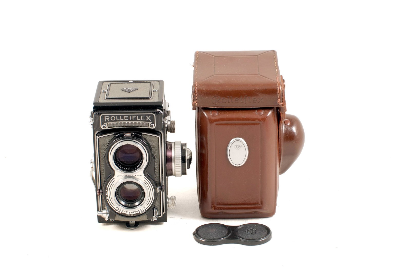 GREY Metered Rolleiflex T #T2109247.: GREY Metered Rolleiflex T #T2109247. With CZ Tessar 75mm f3.5 in Synchro-Compur shutter, (meter working, shutter firing, signs of light use). With cap, strap and ERC.