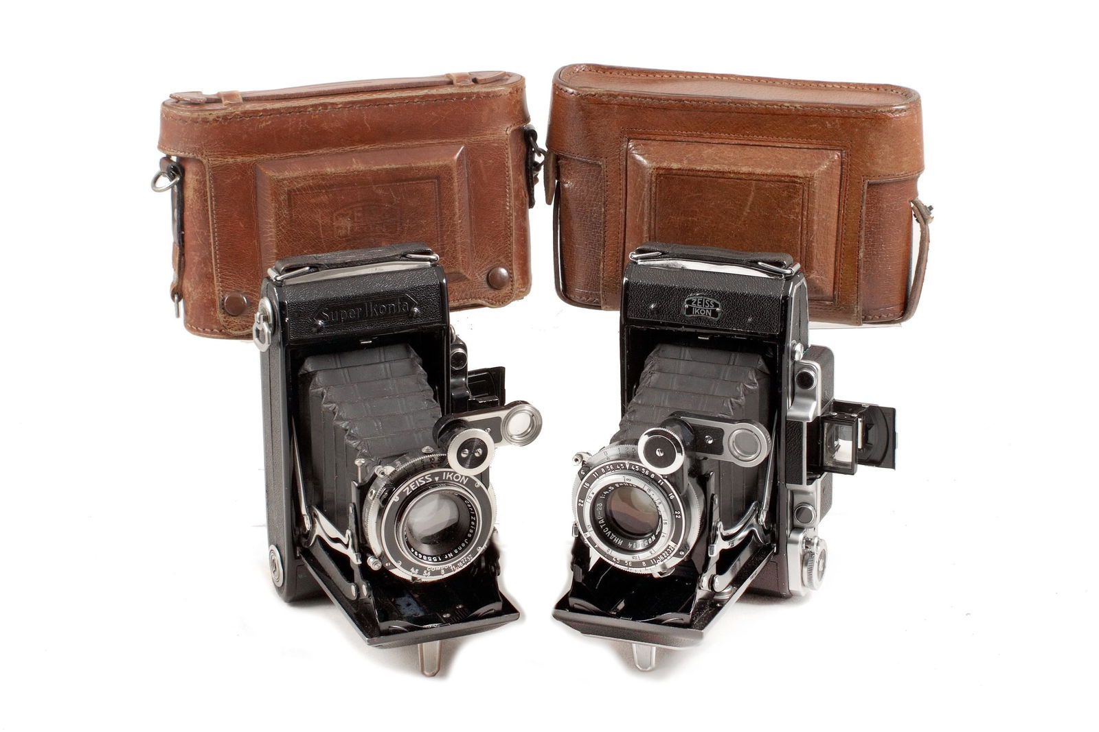 Two Zeiss Ikon Super Ikontas. One a Soviet Hybrid?: Two Zeiss Ikon Super Ikontas. One a Soviet Hybrid? Comprising a Super Ikonta 530/2 with CZJ f4.8 105cm Tessar (shutter firing, signs of normal use) and a Super Ikonta 531/2 fitted with a Soviet Indust