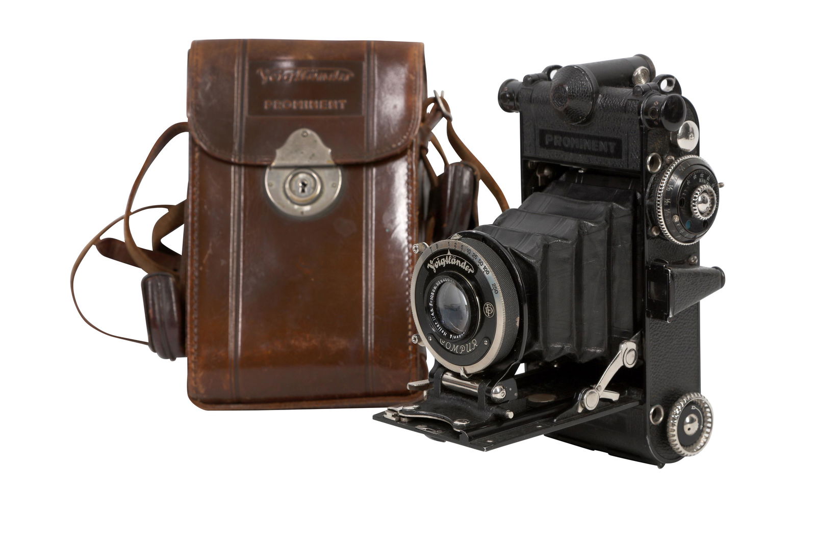 A Voigtlander Prominent 6x9 Folding Rangefinder Camera: A Voigtlander Prominent 6x9 Folding Rangefinder Camera Serial No: D963471 Body: G/VG Shutter: working Lens: Voigtlander 10.5cm f/4.5 Heliar (840077) Optics: G/VG Notes: prism in rangefinder optically