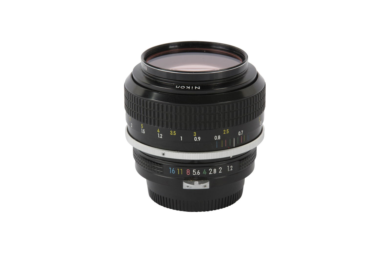 A Nikon 55mm f/1.2 Pre-Ai Lens: A Nikon 55mm f/1.2 Pre-Ai Lens Serial No: 366288 Body: VG Optics:: VG Notes: with caps and instruction manual