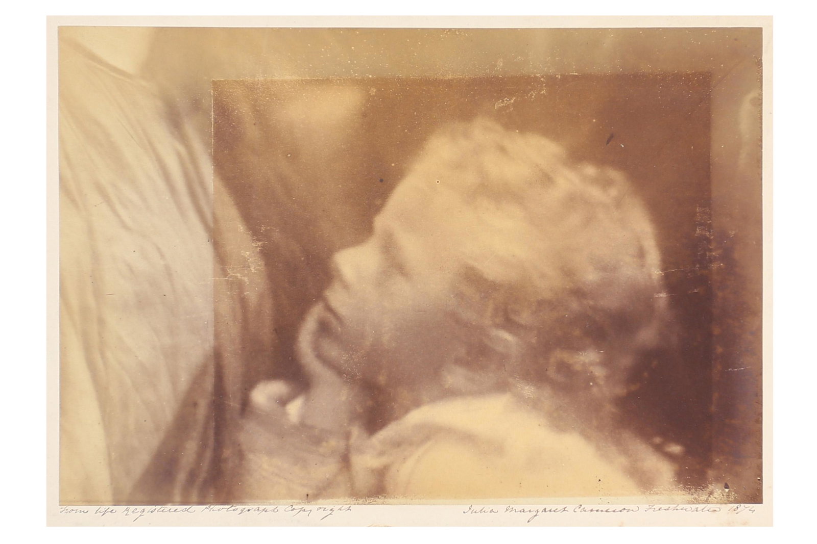 Julia Margaret Cameron (1815-1879): Julia Margaret Cameron (1815-1879) UNTITLED, 1874. Albumen print, image size, 232 x 158mm, mounted on contemporary card (mount size, 284 x 235mm), signed, dated and annotated, 'From Life Registered Ph