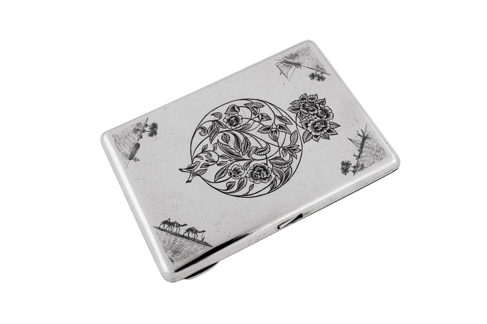 An early 20th century Iraqi silver and niello cigarette (1 of 4)