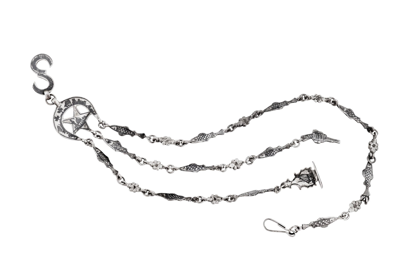An early 20th century Iraqi silver and niello watch: An early 20th century Iraqi silver and niello watch chain chatelaine, Basra circa 1920 The three segment chains formed a nielloed fish and cut rosettes, ending in a virginal seal, a hook and a niello 