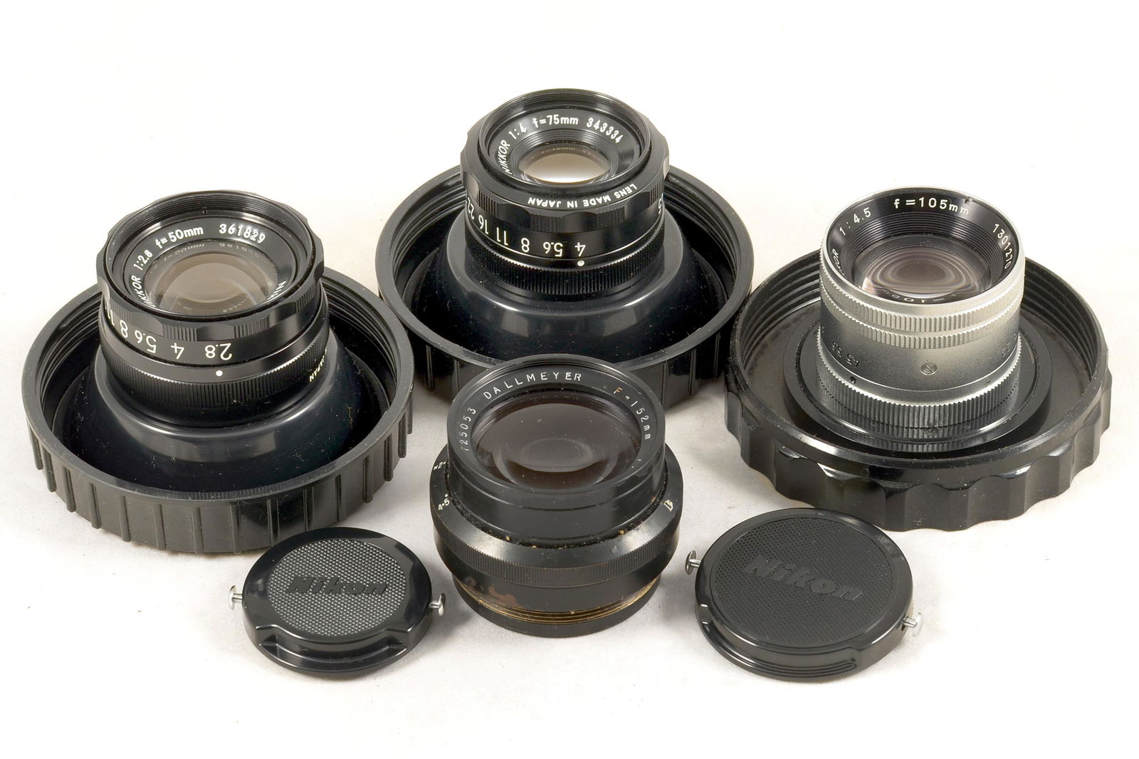 Dallmeyer, Nikon & Minolta Enlarging Lenses.: Dallmeyer, Nikon & Minolta Enlarging Lenses. Comprising Dallmeyer 152mm f4.5, El Nikkor 50mm f2.8 & 75mm f4 and Minolta 105mm f4.5 enlarging lenses. All show signs of light use, internal fungus visibl