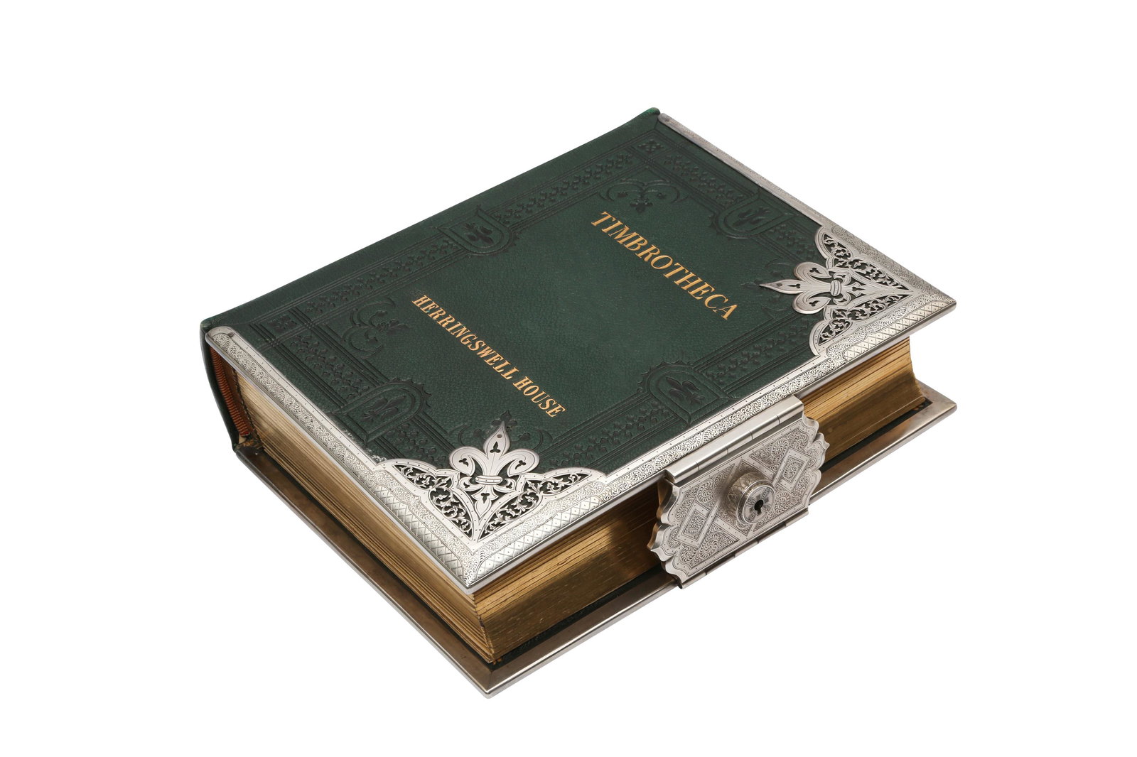 A Victorian Sterling Silver Mounted Photograph Album,: A Victorian sterling silver mounted photograph album, London 1877 by William Thomas Mann (reg. 24th July 1895) The saw pierced mounts cornered with fleur-de-lis and foliate scrolls heightened with eng