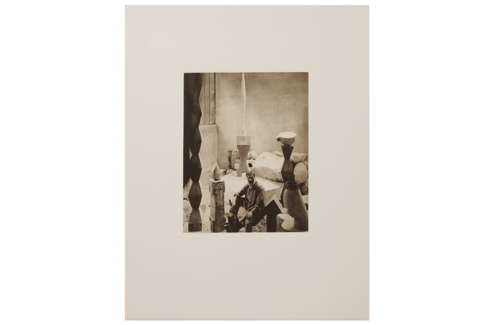 Edward Jean Steichen (1879-1973): Edward Jean Steichen (1879-1973) BRANCUSI IN HIS STUDIO 1925 - PLATE XII FROM THE EARLY YEARS PORTFOLIO (1900-1927). Photogravure, image size 260 x 204mm, sheet size, 510 x 400mm, originally included 