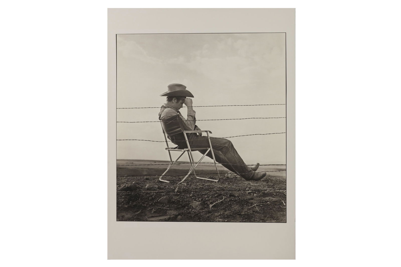 Frank Worth (1923-2000): Frank Worth (1923-2000) JAMES DEAN ON THE SET OF "GIANT", 1955, unmarked, unsigned platinum print, printed later, probably a test print for the portfolio, image size, 562 x 506mm, sheet size 765 x 565