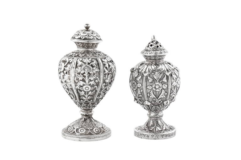 Two mid to late 19th century Anglo Indian unmarked silver pepper