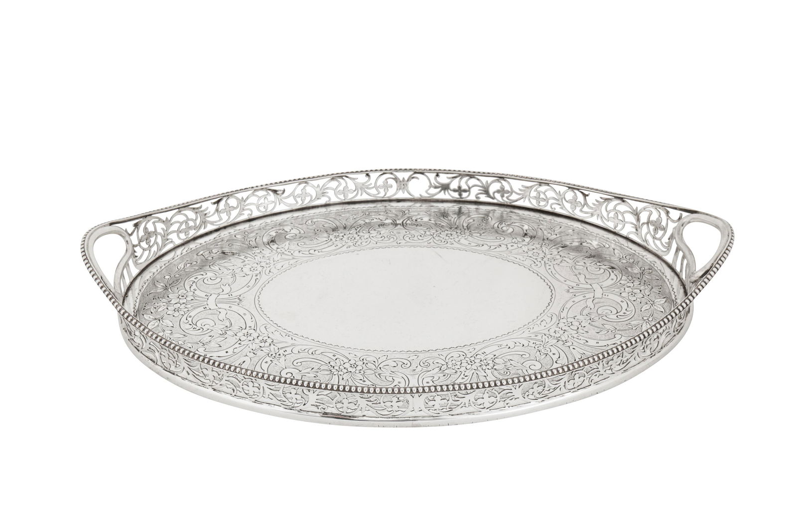 A small Victorian sterling silver twin handled tray, London 1901 by Charles Stuart Harris: A small Victorian sterling silver twin handled tray, London 1901 by Charles Stuart Harris Of oval form with a pierced galleried edge of foliate scrolls and quatrefoils, with a beaded rim and integral