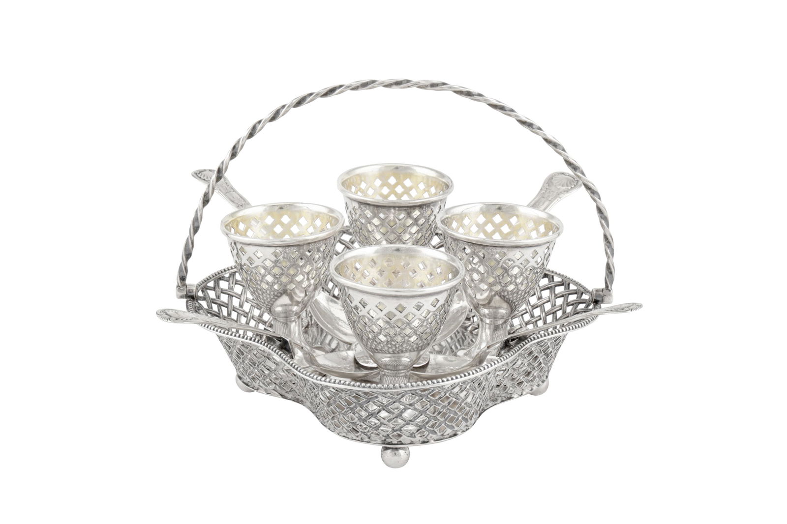 A Victorian sterling silver egg cruet, Sheffield 1884 by Henry Wilkinson and Co: A Victorian sterling silver egg cruet, Sheffield 1884 by Henry Wilkinson and Co Of shaped quatrefoil form with a pierced basket weave decoration with a beaded rim, all raised upon four compressed ball