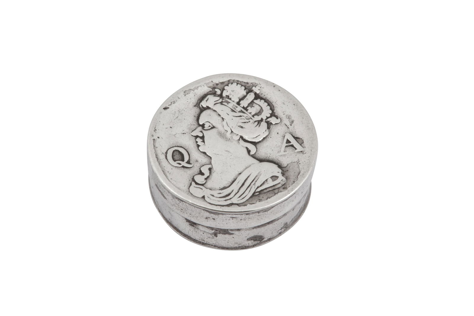 A Queen Anne silver commemorative patch box, London circa 1705 by Thomas Keddan: A Queen Anne silver commemorative patch box, London circa 1705 by Thomas Keddan Of short cylindrical form, the front with an embossed portrait bust of Queen Anne between initials Q A. Marked TK only.