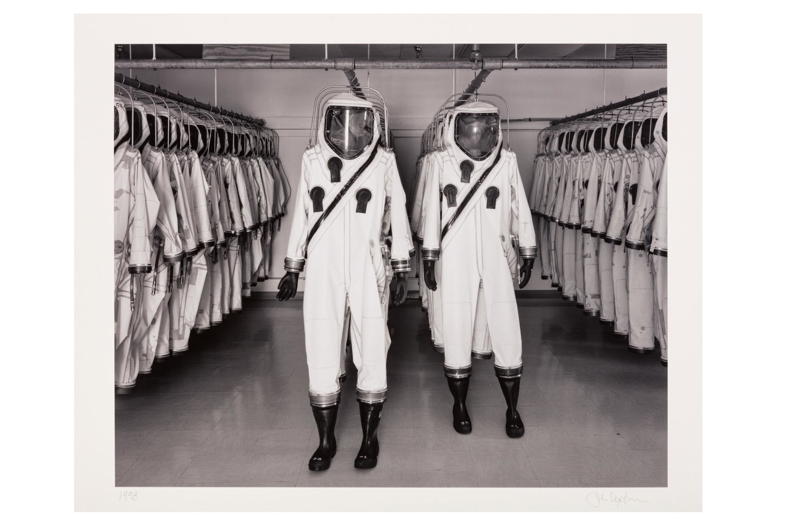 John Sexton (b.1953): John Sexton (b.1953) SCAPE SUITS, KENNEDY SPACE CENTER, FL, 1998. Silver gelatin print, printed 2021, flush-mounted to board, image/sheet size 263 x 330mm, board size 405 x 508mm, signed and dated by