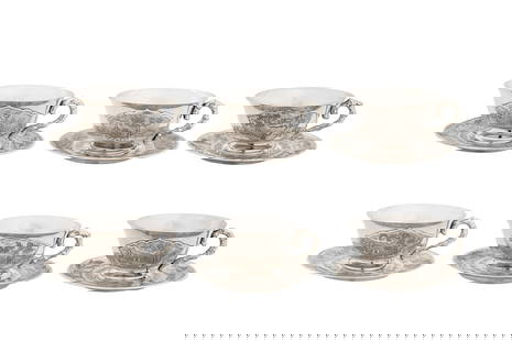 A set of six early 20th century Vietnamese silver tea cups and saucers, Hanoi circa 1960: A set of six early 20th century Vietnamese silver tea cups and saucers, Hanoi circa 1960 Comprising six cups and six saucers, each of circular form. The cups with handles modelled as bamboo. Each with