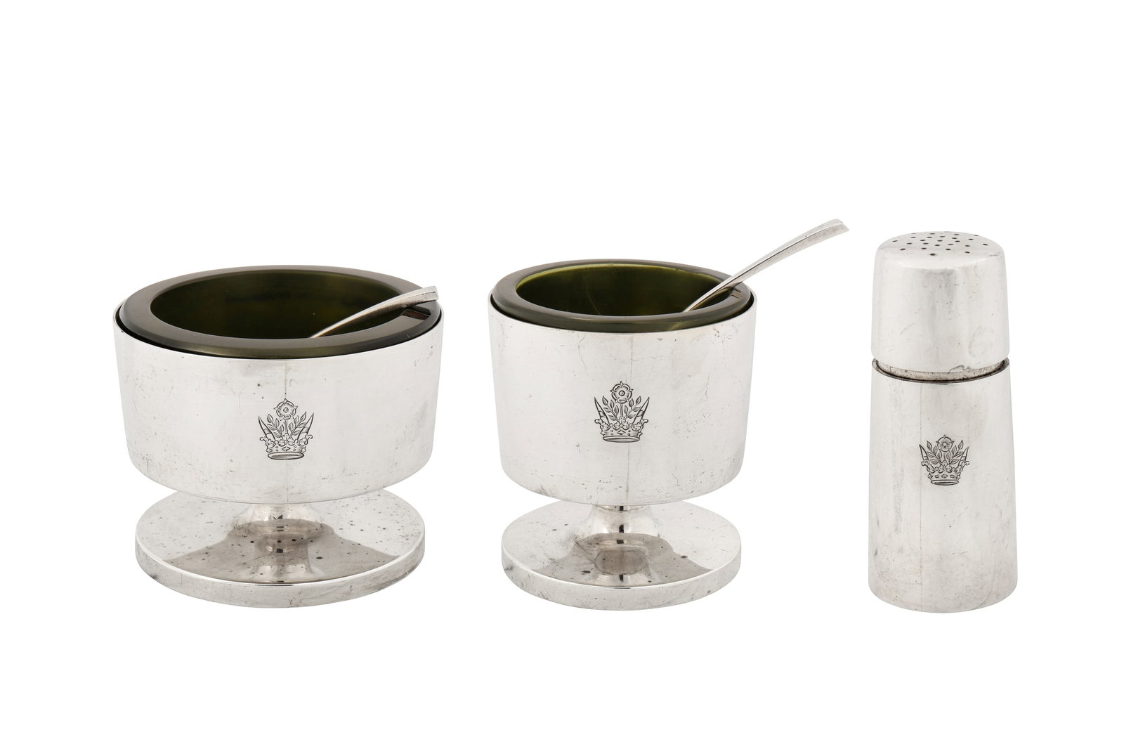 An Elizabeth II modernist sterling silver three-piece condiment set, London 1965/66 by Gerald Benney: An Elizabeth II modernist sterling silver three-piece condiment set, London 1965/66 by Gerald Benney (1930-2008) Comprising a mustard pot, a salt, and a cayenne pepper pot (1965). Each of plain rounde