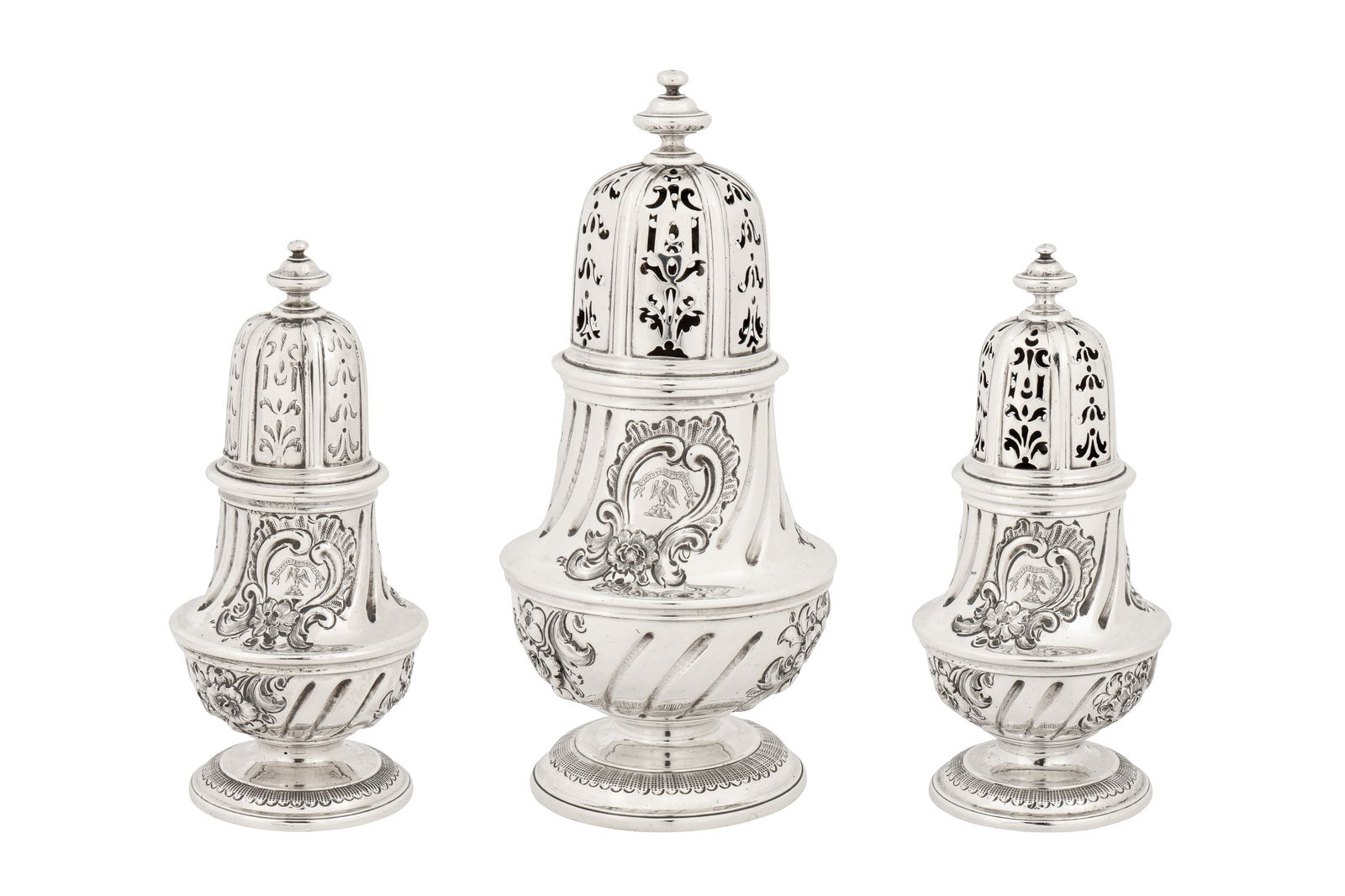 A graduated set of three early George II sterling silver casters, London 1727 by George Wickes (reg. (1 of 6)