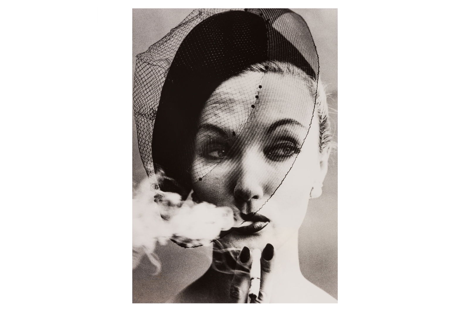 William Klein (1926-2022): William Klein (1926-2022) SMOKE + VEIL, PARIS (VOGUE), 1958. Silver gelatin print, printed later, image size 560 x 390mm, sheet size 608 x 508mm, signed, titled, and dated by the photographer in penci