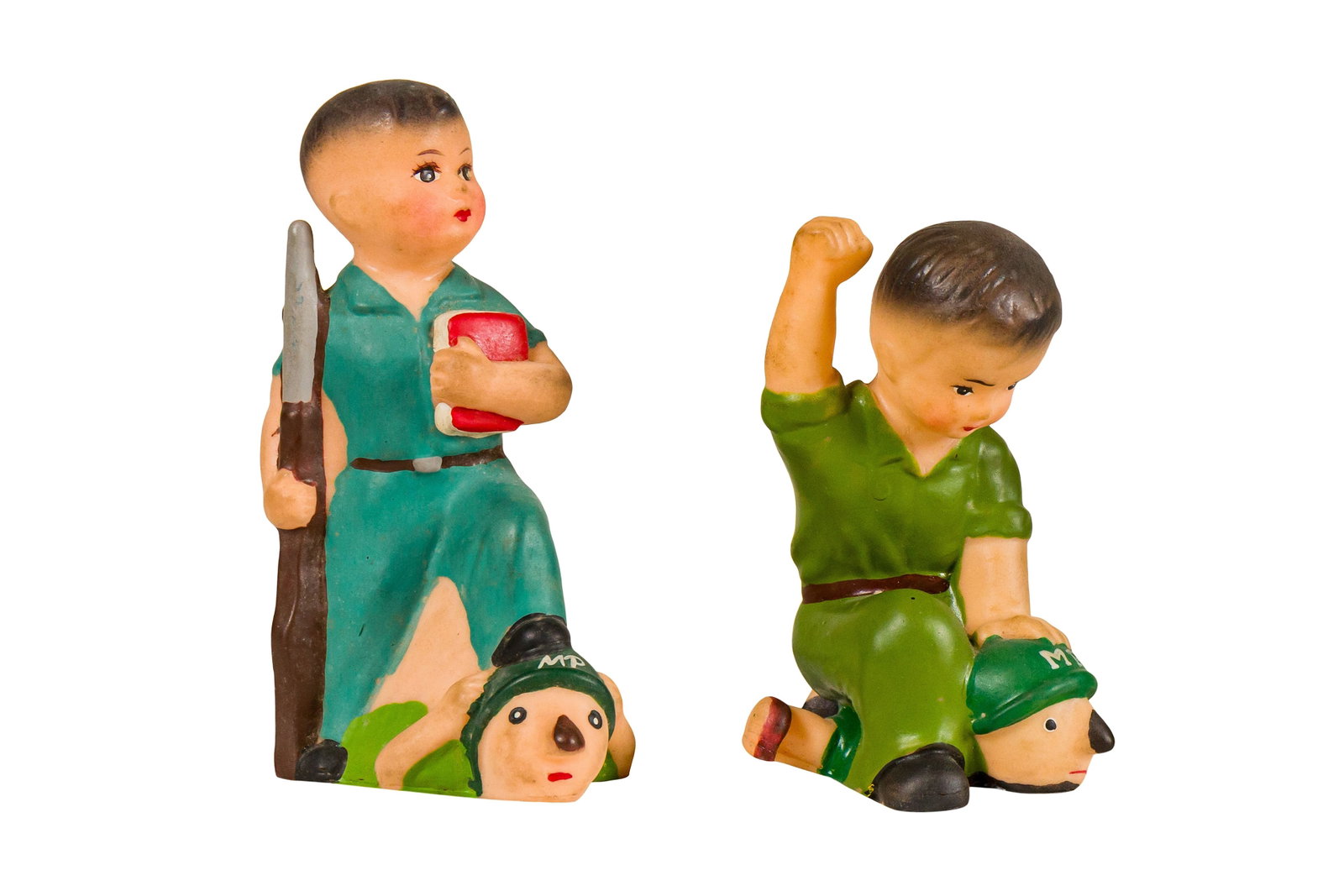 Cultural Revolution Era Toys: Cultural Revolution Era Toys, A pair of Little Red Guard Rubber Toys, c.1969, one figure holds a rifle with bayonet in one hand, and clutches a Little Red Book to his heart with the other, his left fo