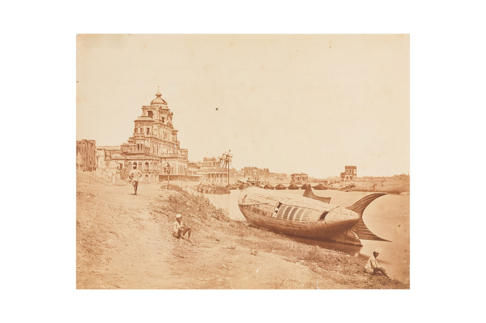 Felice Beato (1832-1909): THE CHATTAR MANZIL PALACE AND THE ROYAL BOUT OF OUDE, 1858. Albumen print, image/sheet size 233 x 297, titled in pencil with manuscript caption in ink verso: "The Chuter Manzil Palace used as a Genera