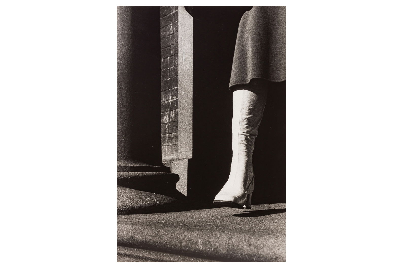 Ralph Gibson (b. 1939): Ralph Gibson (b. 1939) UNTITLED (WHITE BOOT), 1974. Vintage silver gelatin print, image size 310 x 205mm, sheet size 355 x 275mm, signed, dated, and editioned '49/50' in ink lower right margin recto.