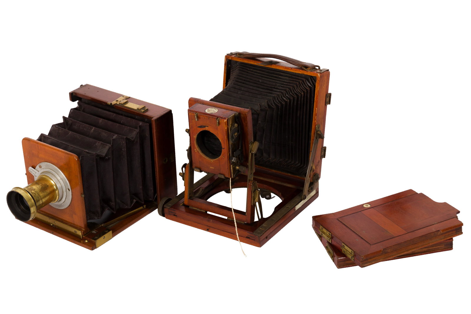 Two British Quarter Plate Mahogany & Brass Cameras: Two British Quarter Plate Mahogany & Brass Cameras Unmarked Quarter Plate w/ Dallmeyer LensBody: G - red leather bellows, one small repair, Schew & Co. focussing mount (stiff) rack and pinion