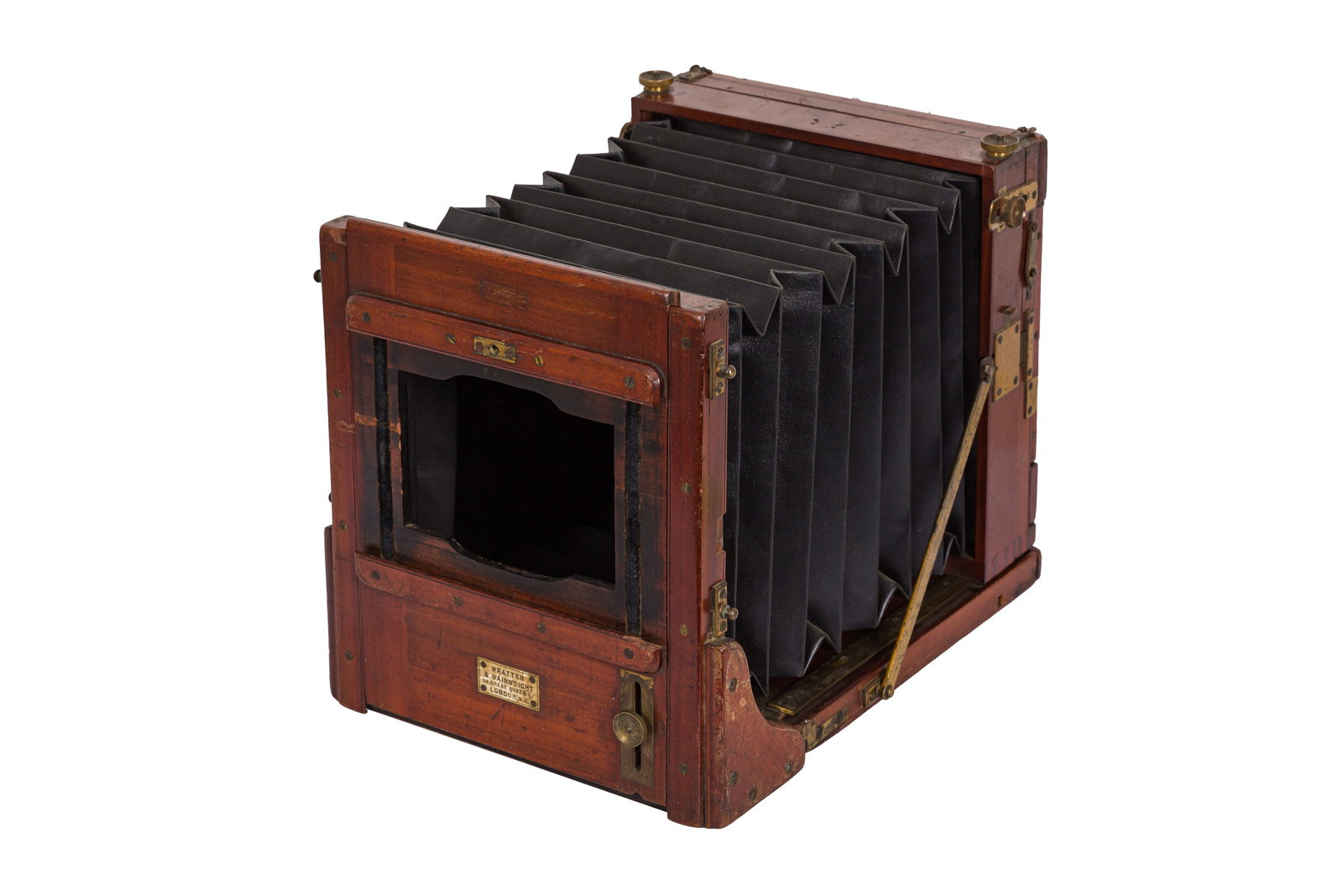 A Wratten & Wainwright Half Plate Tailboard Mahogany & Brass Camera: A Wratten & Wainwright Half Plate Tailboard Mahogany & Brass Camera Body: G - black leather bellows, missing lens board. Notes: maker's plate reads Wratten & Wainwright, 38 Great Queens St