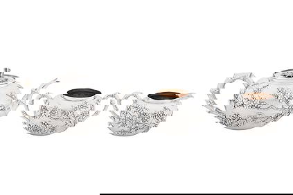 A late 19th / early 20th century Chinese export silver three-piece tea service, Canton circa 1900, (1 of 9)
