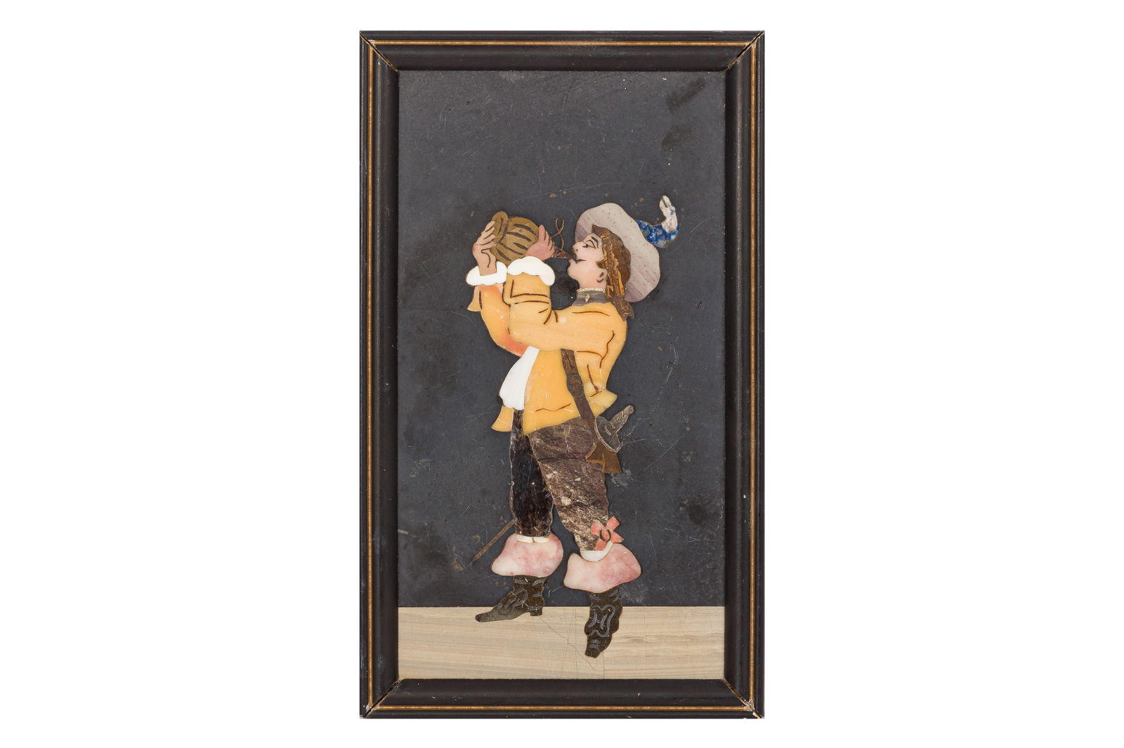 AN EARLY 20TH CENTURY ITALIAN REVIVAL STYLE PIETRA DURA PLAQUE OF A MUSKETEER: AN EARLY 20TH CENTURY ITALIAN REVIVAL STYLE PIETRA DURA PLAQUE OF A MUSKETEER, in yellow attire, drinking from a flask, composed of various inlaid semi-precious stones, including jasper, marble, and a