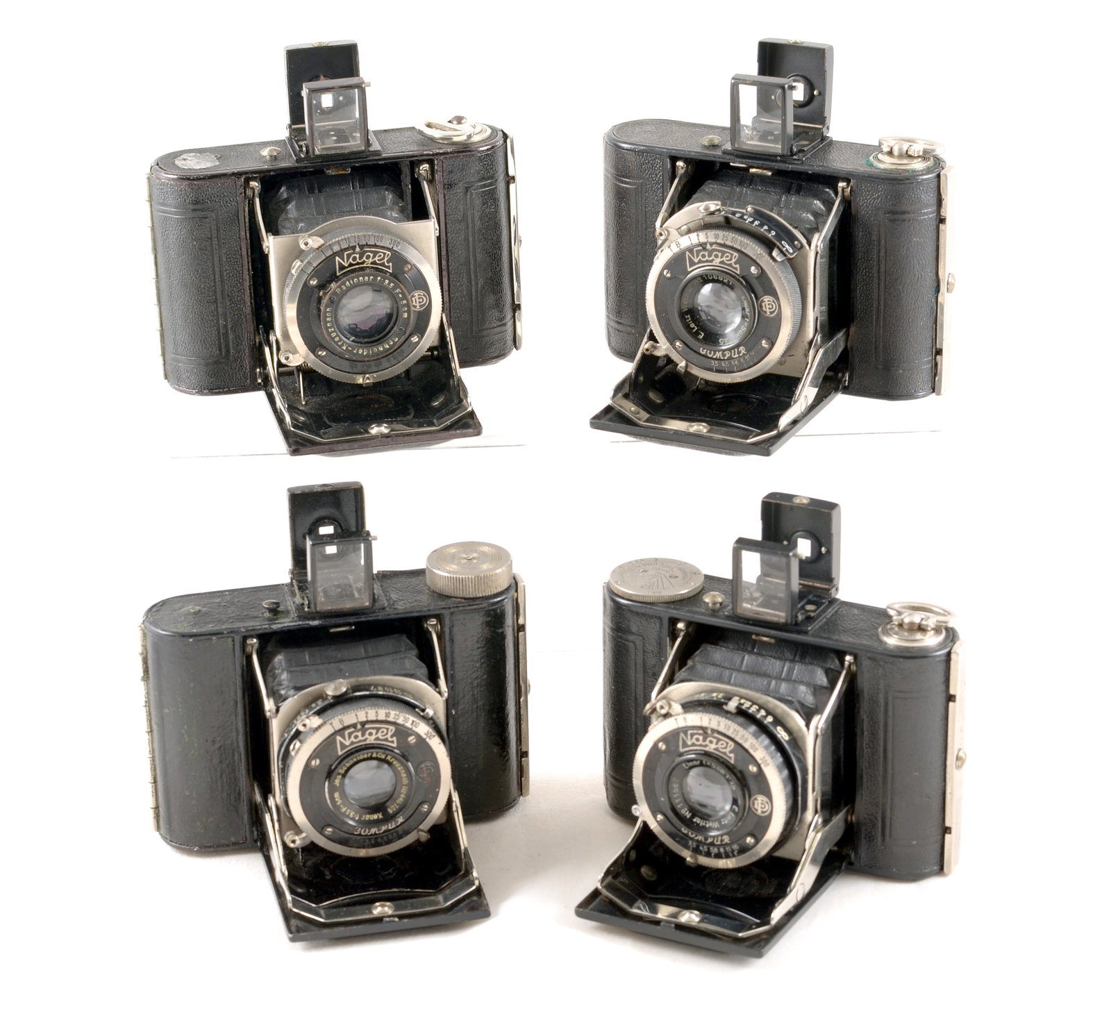 Group of Four Nagel Vollenda Cameras. Leitz Elmar & Other Lens Variants: Group of Four Nagel Vollenda Cameras. Leitz Elmar & Other Lens Variants. Two with Leitz Elmar 5cm f3.5 lens, one with Schneider Xenar 5cm f3.5 lens and one with Shchneider Radionar 5cm f3.5 lens. All 