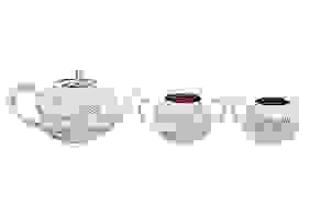 A late 19th / early 20th century Chinese export silver three-piece tea service, Canton circa 1900, First Image