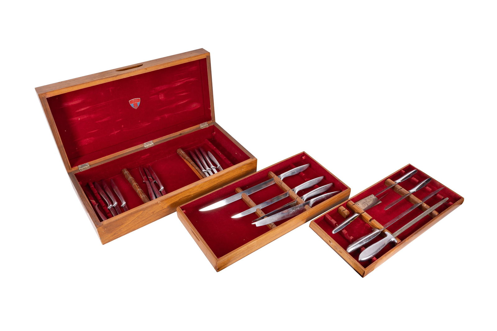 A CASED SET OF GERBER STEEL KNIVES,: A CASED SET OF GERBER STEEL KNIVES, five carving knives, three kitchen knives, ten larger and one smaller table knives, and a carver, each stamped maker's mark and model name, contained across three l