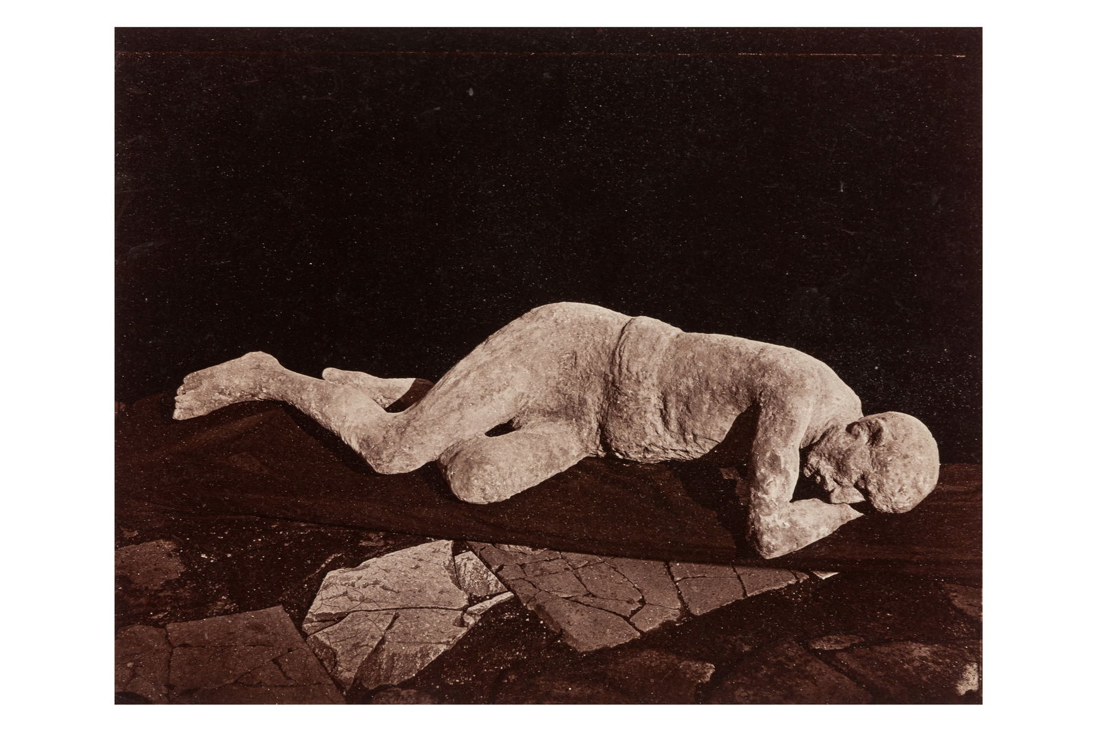 Giorgio Sommer (1834-1914): Giorgio Sommer (1834-1914) IMPRONTE UMANE, POMPEII, 1873. Albumen print pasted down to period card, image size 20 x 25cm, card size 31 x 39.5cm, titled, numbered, and credited in the lower negative. F