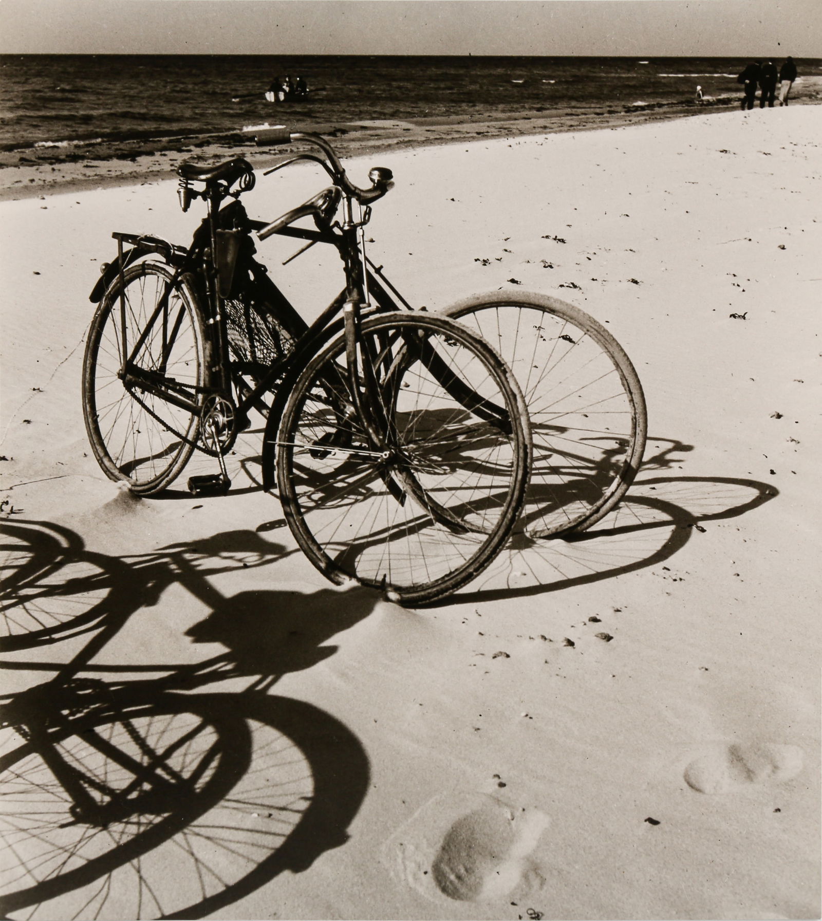 § Herbert List (1903-1975): Herbert List (1903-1975) A PAIR OF ESTATE PRINTS, 1930-1932. A pair of silver gelatin prints, printed later, comprising "Bicycles at the Baltic Sea", image/sheet size 25.5 x 23cm, and "Can on Parapet,