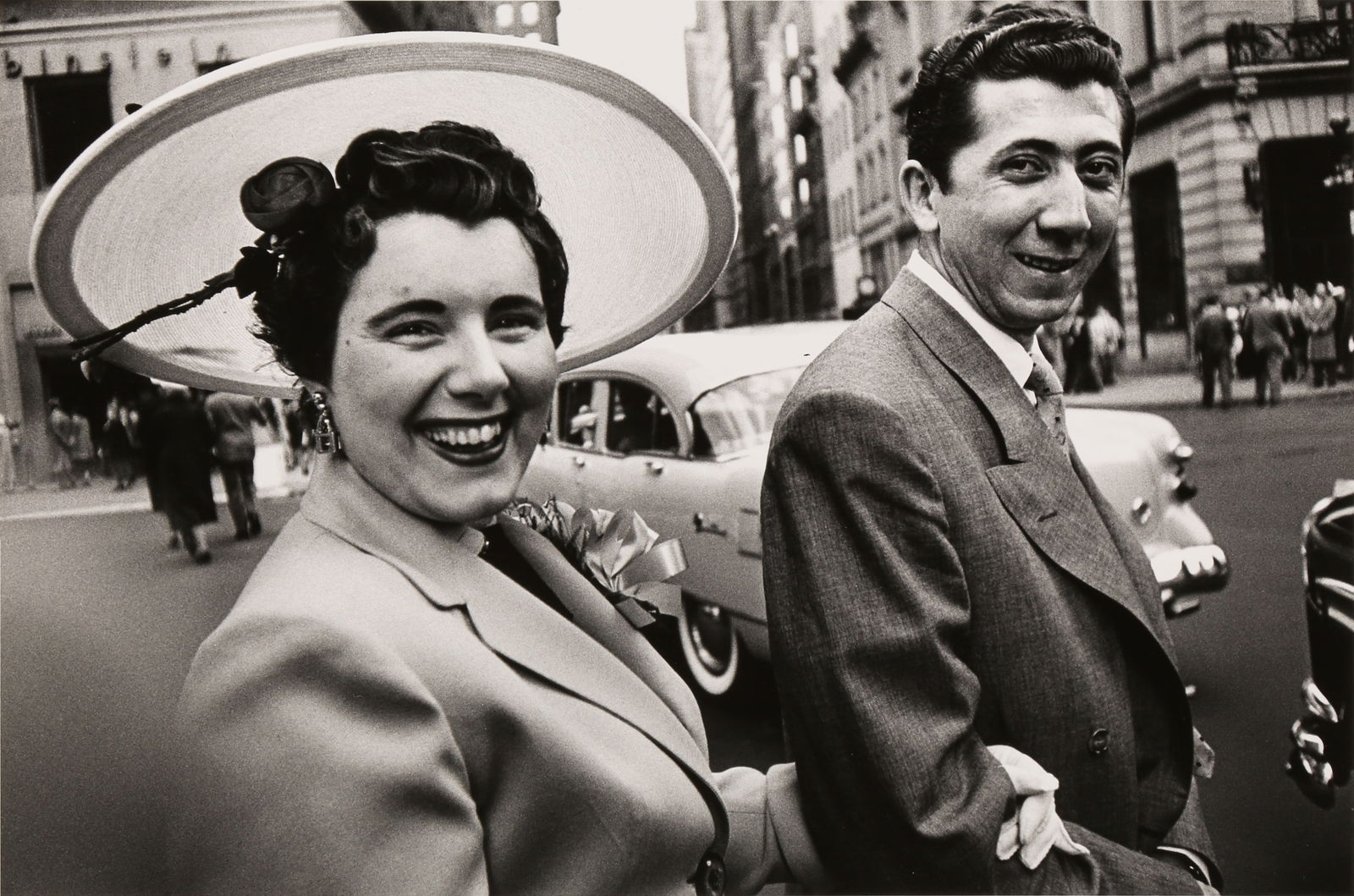 § William Klein (1926-2022): William Klein (1926-2022) EASTER HAT COUPLE, NY, 1955. Silver gelatin print, printed 1998, image size 24 x 36cm, sheet size 30.5 x 40cm.