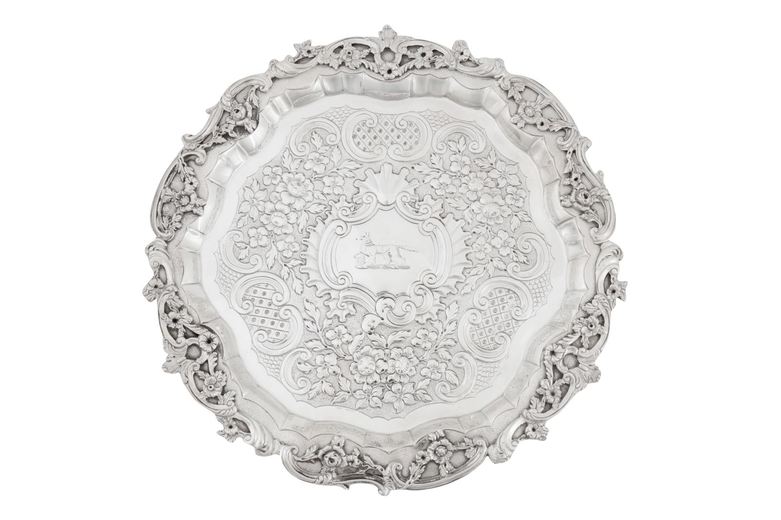 A George IV sterling silver salver, London 1820 by Robert Hennell II: A George IV sterling silver salver, London 1820 by Robert Hennell II A George IV sterling silver salver, London 1820 by Robert Hennell II Of shaped circular form with a cast and applied broad edge wit