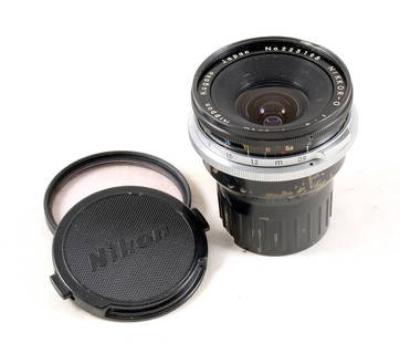 Nikkor-Q 2.1cm f4 Ultra Wide lens for Nikon SLR Cameras.: Nikkor-Q 2.1cm f4 Ultra Wide lens for Nikon SLR Cameras. #223198. Signs of normal+ use with light internal fungus to front element, minor rub marks to coating of rear element.