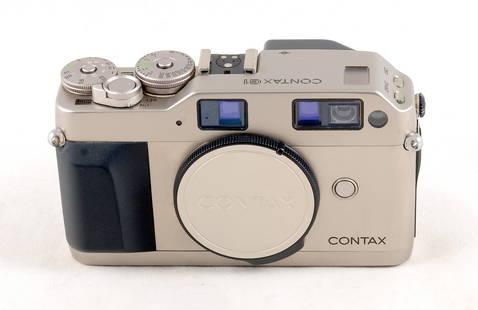 Contax G1 Compact Film Camera Body, Green Sticker.: Contax G1 Compact Film Camera Body, Green Sticker. Body #103689. Shutter firing and meter responsive. Slight ring marks around tripod mount, otherwise signs of normal use.