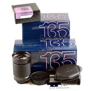 FAST Carl Zeiss 135mm f2 Planar T* Prime Lens, 60 Years Limited Edition.: FAST Carl Zeiss 135mm f2 Planar T* Prime Lens, 60 Years Limited Edition. Contax Yashica Mount. #7328801. Looks to be unused. With 72mm 1A filter, soft pouch, caps, metal lens hood, etc. All in makers
