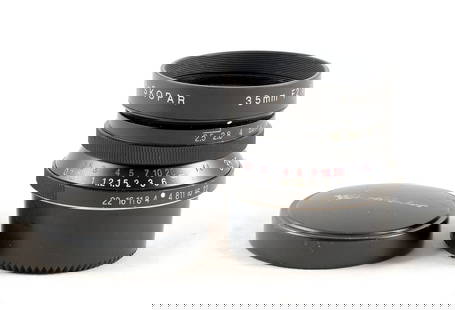 L39 Screw Mount Voigtlander 35mm f2.5 Color-Skopar MC Lens.: L39 Screw Mount Voigtlander 35mm f2.5 Color-Skopar MC Lens. #9960299. Signs of normal use. With caps and hood (slightly loose).