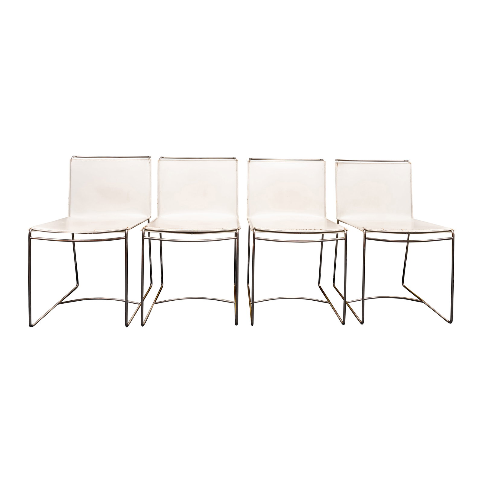 Pascal Mourgue (French 1943-2014) Ligne Roset, France Set of four 'Fil' chairs: Pascal Mourgue (French 1943-2014) Ligne Roset, France Set of four 'Fil' chairs Circa 2000s White Leather, chrome80cm high x 44cm wide x 39cm deep